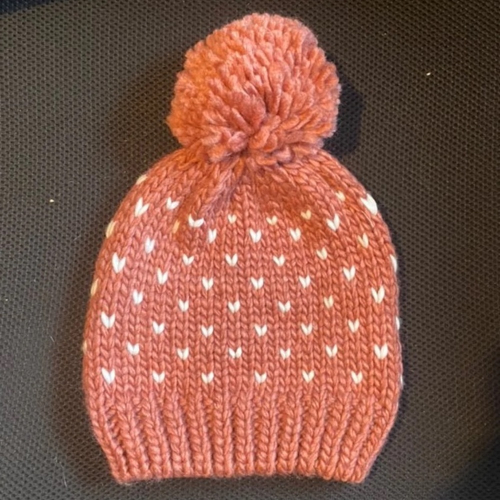 Lauren Conrad Pink winter hat with white hearts never worn.